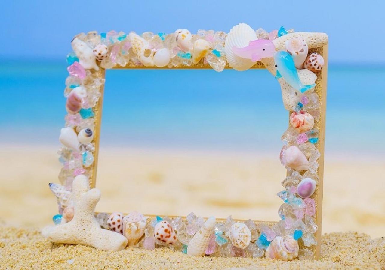 منتجع وسبا فندق مونتيري أوكيناوا أونا المظهر الخارجي الصورة A seashell frame
